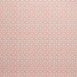 Close up of wallpaper with small scale playful geometric lattice pattern in pink on a white background. 