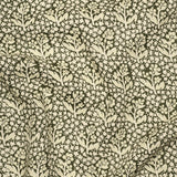 Fabric with a subtle floral pattern on a dark background