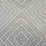 Broadloom carpet sample in a linear diamond design in white and taupe. 