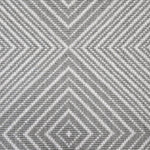 Broadloom carpet sample in a linear diamond design in white and pewter grey.
