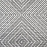 Broadloom carpet sample in a linear diamond design in white and pewter grey.