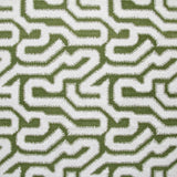 Detail of fabric in a playful meandering print in white on an olive field.