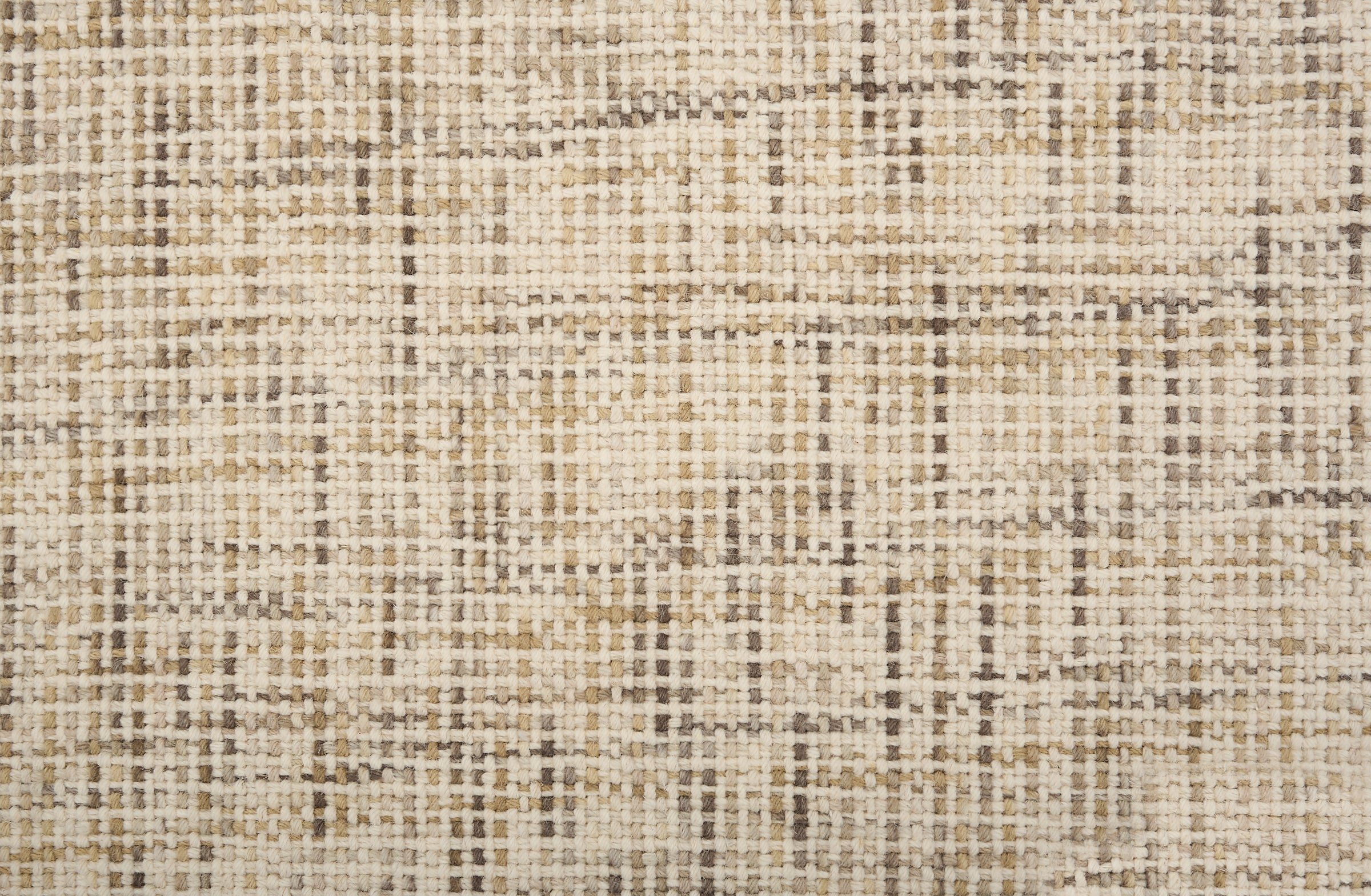 Broadloom carpet in a textural basket weave in cream mixed with shades of brown and tan. 