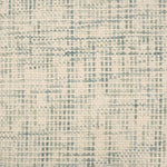 Broadloom carpet in a textural basket weave in cream mixed with blue and green.