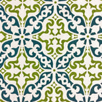 Detail of fabric in a damask print in green and navy on a cream field.