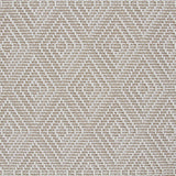 Broadloom carpet in a raised diamond pattern in cream.