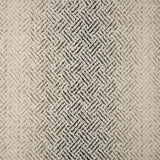 Broadloom with a geometric pattern on an ombré background in cream and emerald green.