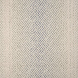 Broadloom with a geometric pattern on an ombré background in cream and grey.