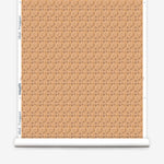 Wallpaper roll with small scale watercolor floral in warm beige.