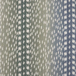 Broadloom carpet with a cream dashed stripe on an ombré field in blue and green. 