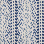 Broadloom carpet with a dashed stripe in shades of blue on a cream field. 