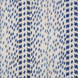 Broadloom carpet with a dashed stripe in shades of blue on a cream field. 