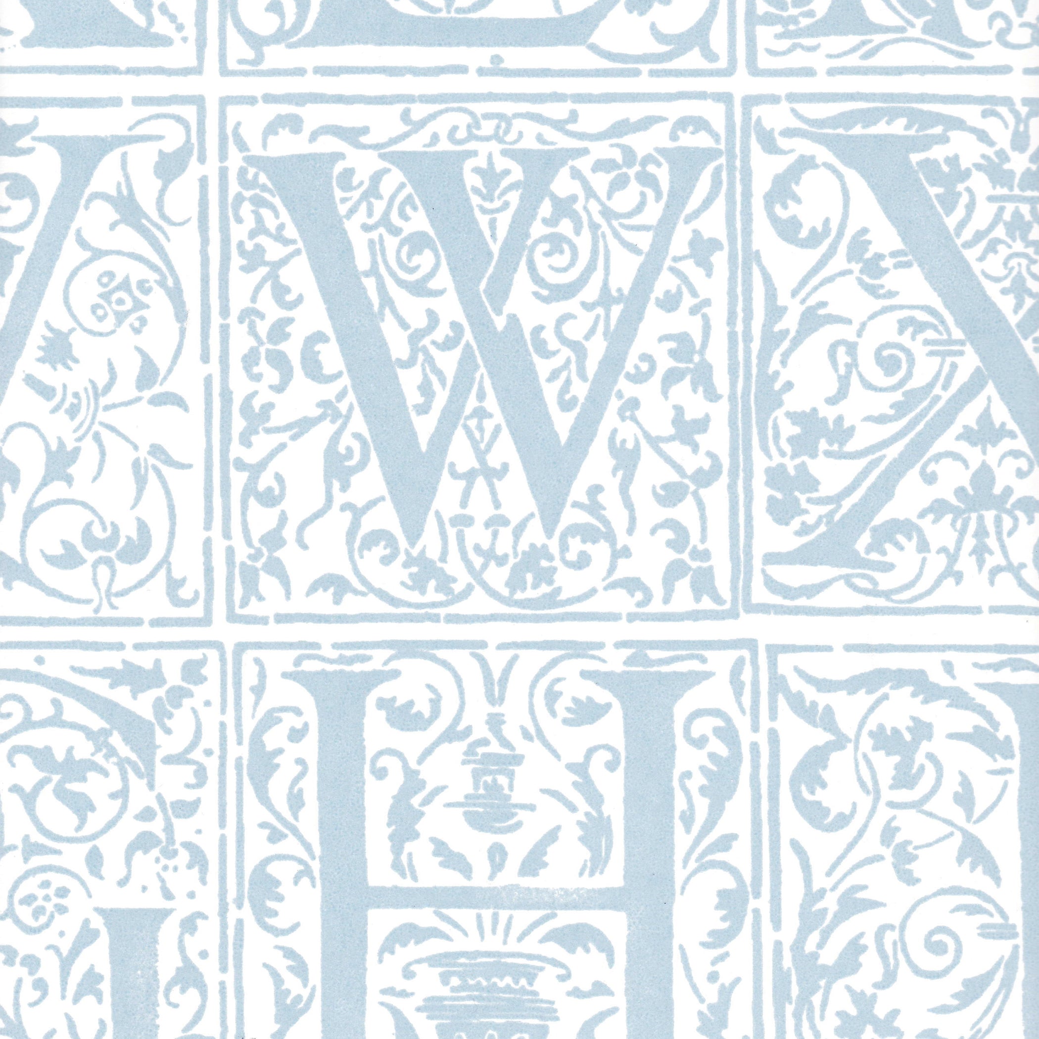 Detail of wallpaper in a playful alphabet grid print in light blue on a white field.