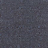 Detail of fabric in a dense paisley print in brown on a navy field.