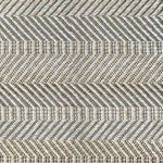 Broadloom carpet sample in a neutral herringbone pattern