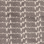 Detail of fabric in an abstract curvilinear stripe in black on a tan field.