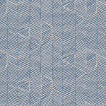 Detail of fabric in a dense herringbone print in dusty blue on a tan field.