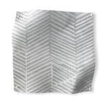 Square fabric swatch in a dense herringbone print in light gray on a white field.