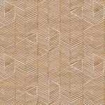 Detail of fabric in a dense herringbone print in sienna on a tan field.