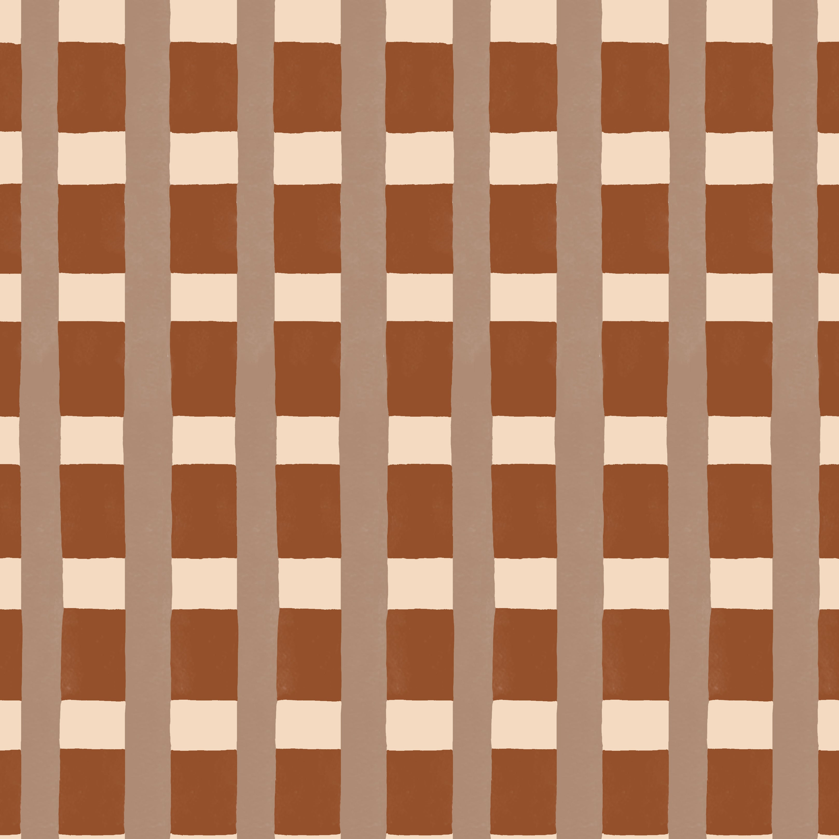 A fabric pattern detail in a gridded check pattern in brick red, clay and cream. 