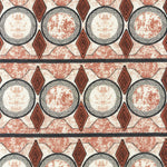 Detail of fabric in an intricate geometric stripe in shades of rust, gray and cream.