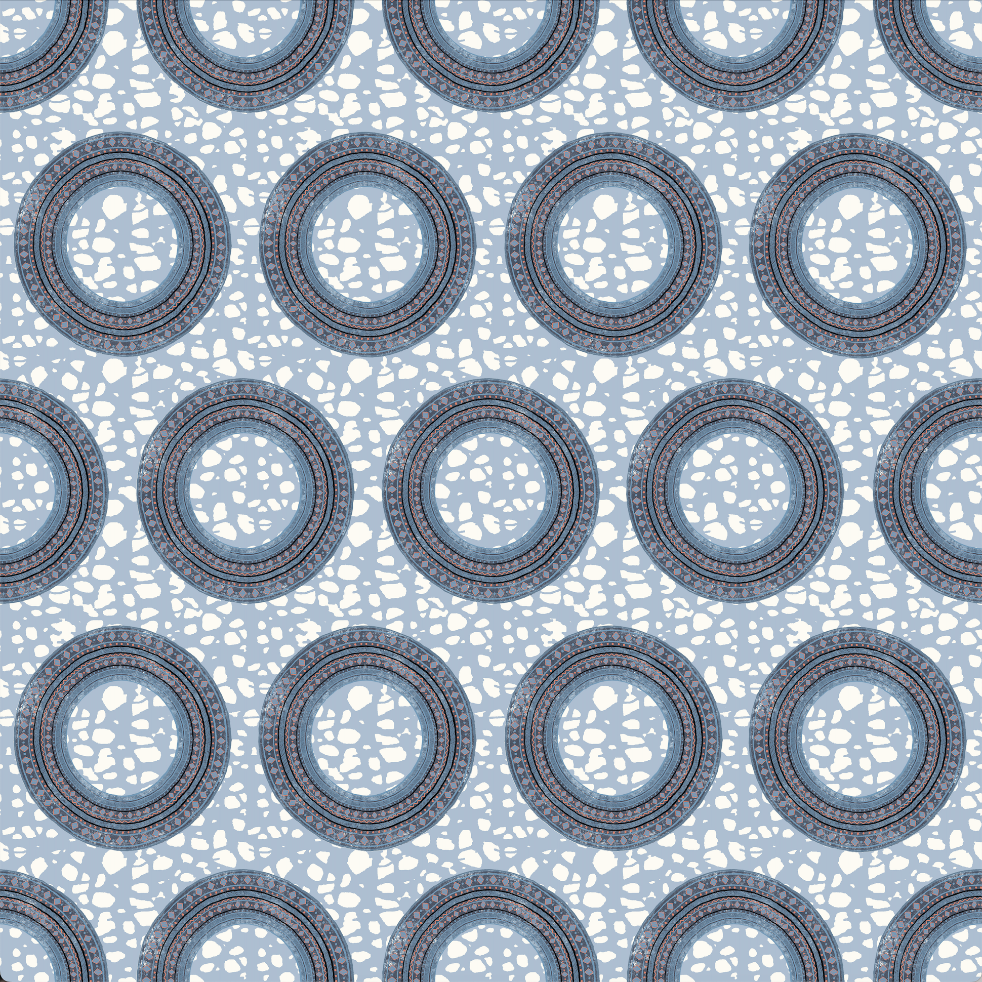 Pattern of circular shapes on a light blue background