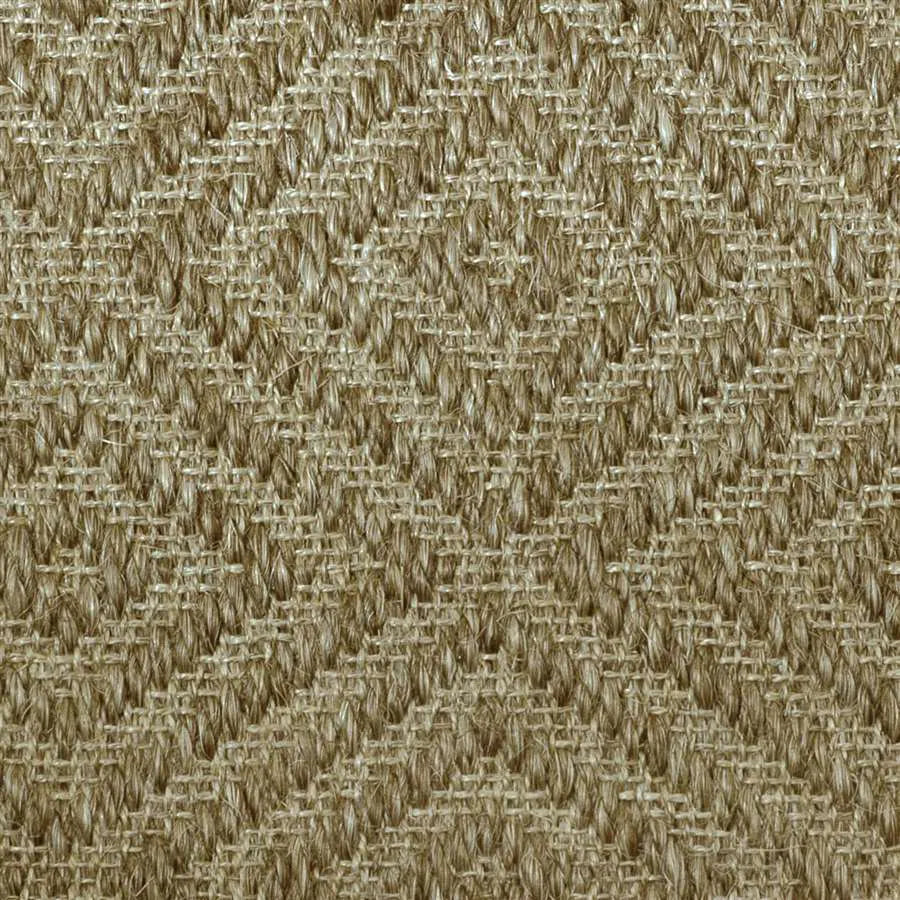 Close-up of a textured natural fibre woven diamond pattern rug in tan. 