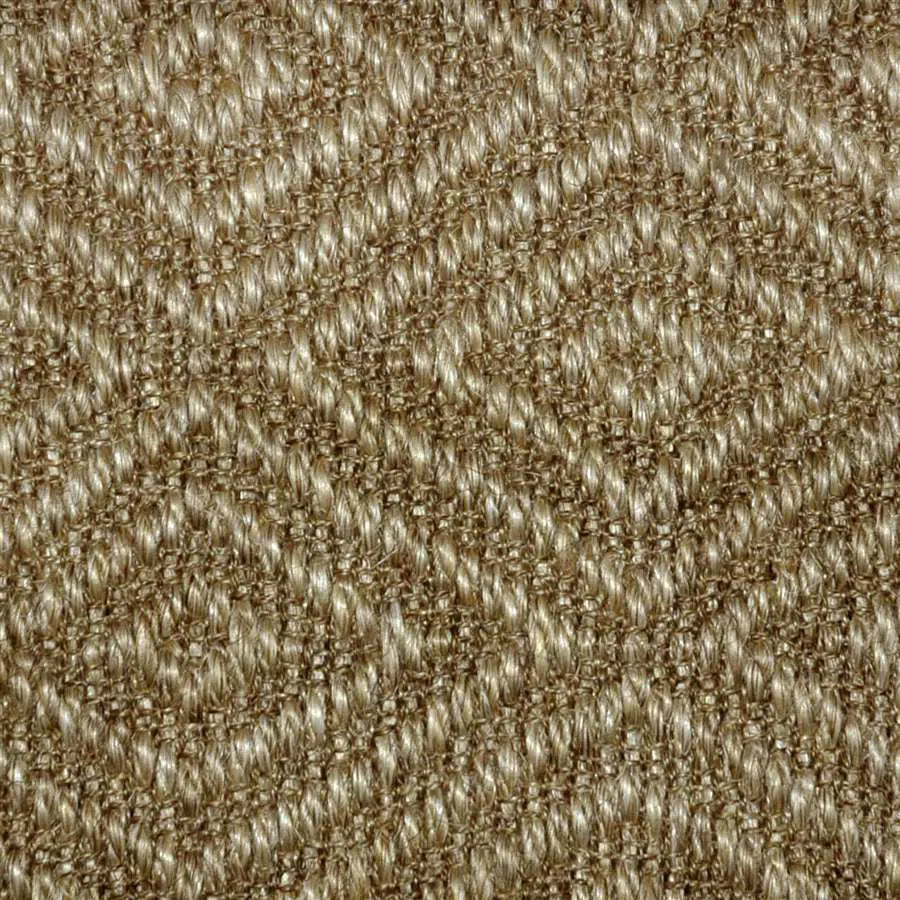 Close-up of a textured natural fibre woven diamond pattern rug in tan. 