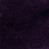 Detail of velvet fabric yardage in dark purple.