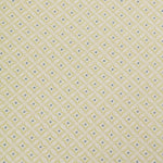 Detail of woven fabric in a geometric grid print in yellow and blue on a tan field.