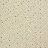 Detail of woven fabric in a geometric grid print in yellow and blue on a tan field.