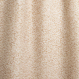 Draped fabric with small scale coral design in warm tan on white. 