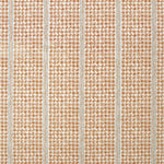 Detail of fabric in a dense repeating stripe and star print in burnt orange on a cream field.