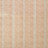 Detail of fabric in a dense repeating stripe and star print in burnt orange on a cream field.