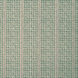 Detail of fabric in a dense repeating stripe and star print in green on a tan field.