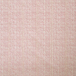 Detail of fabric in a dense repeating stripe and star print in pink on a cream field.