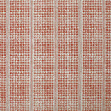 Detail of fabric in a dense repeating stripe and star print in red on a cream field.