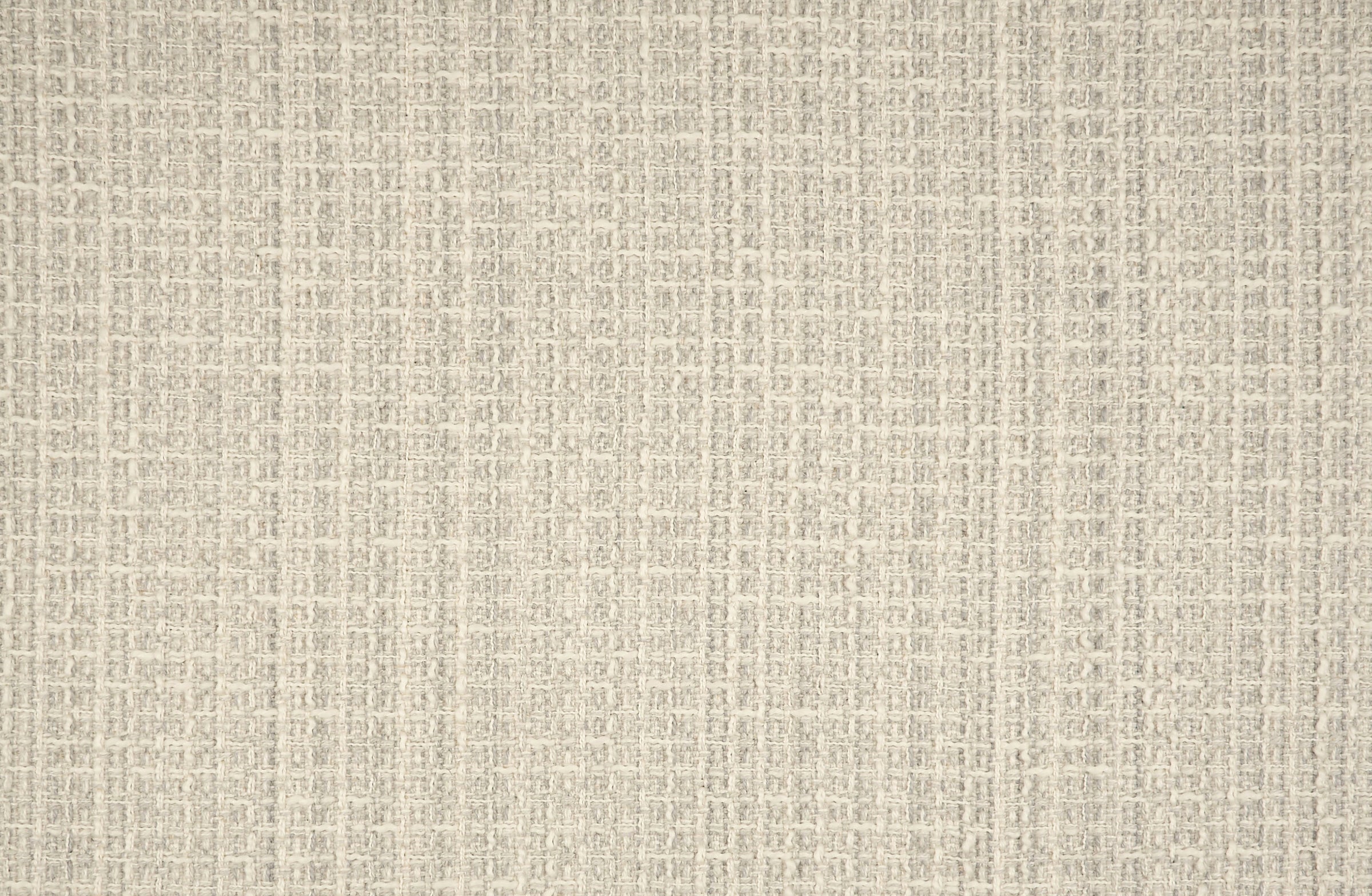 Broadloom carpet in a textural weave in pale grey.
