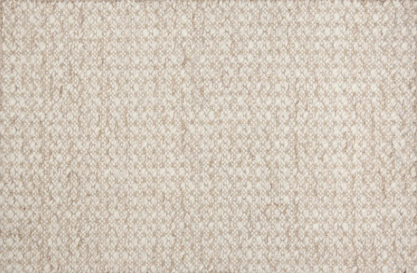 Broadloom carpet swatch in a textured pattern in a cream tan design