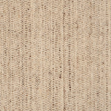 Textural strié broadloom in shades of light brown.