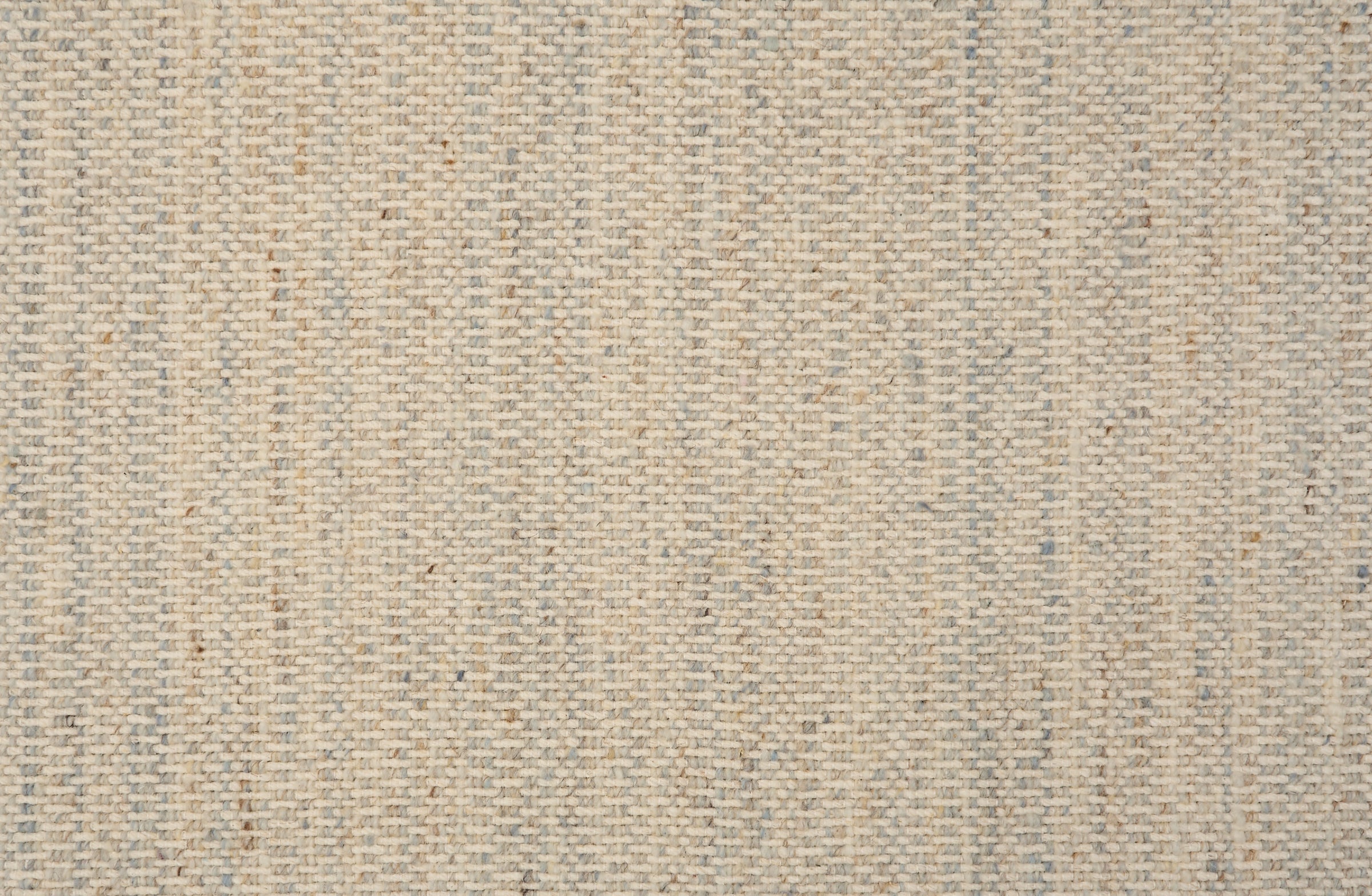 Textural strié broadloom in shades of cream and pale blue.