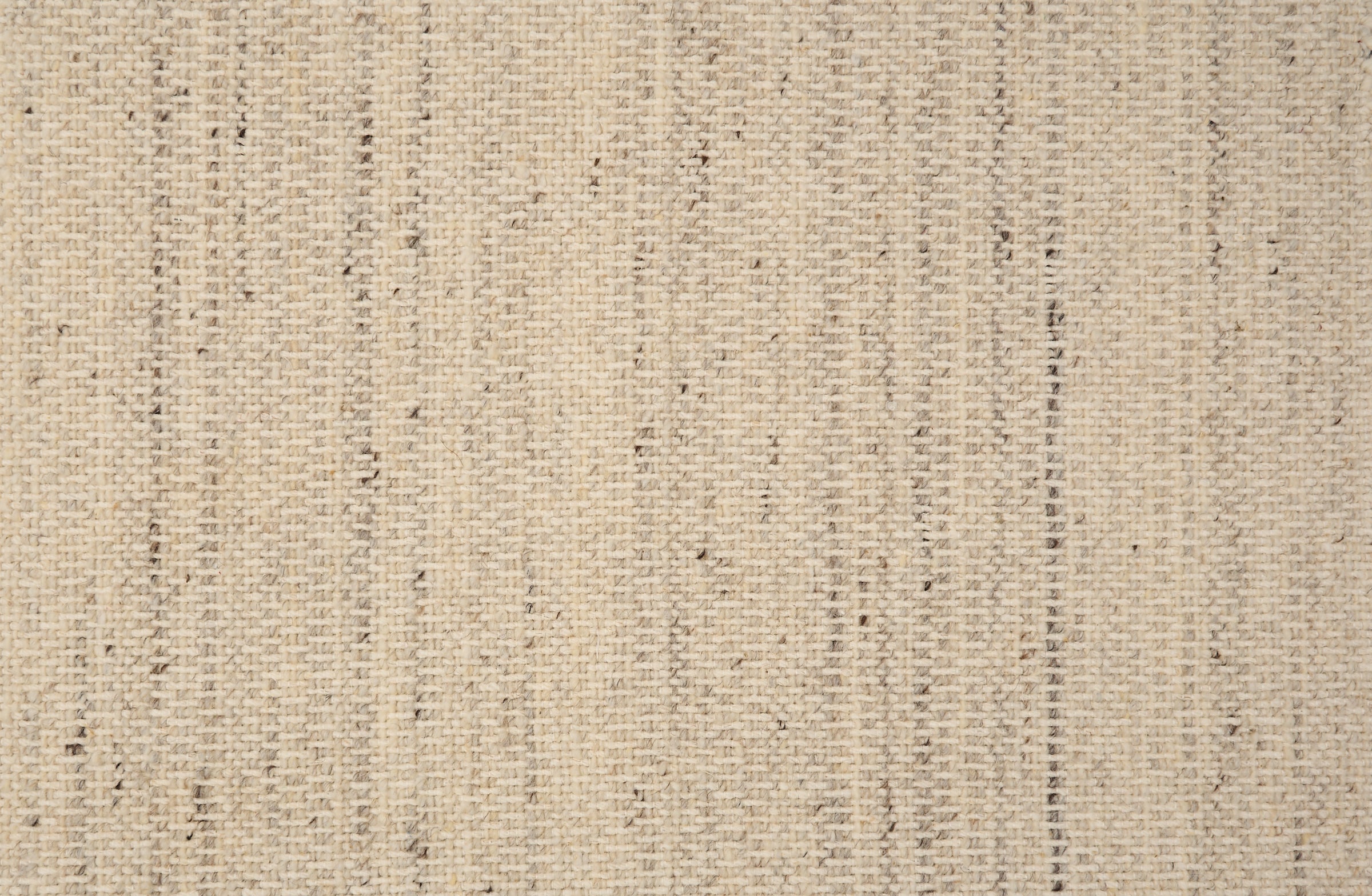 Textural strié broadloom in shades of cream and grey.