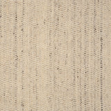 Textural strié broadloom in shades of cream and grey.