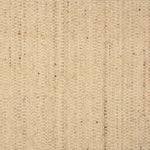 Textural strié broadloom in shades of warm beige.