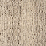 Textural strié broadloom in shades of ecru and brown.