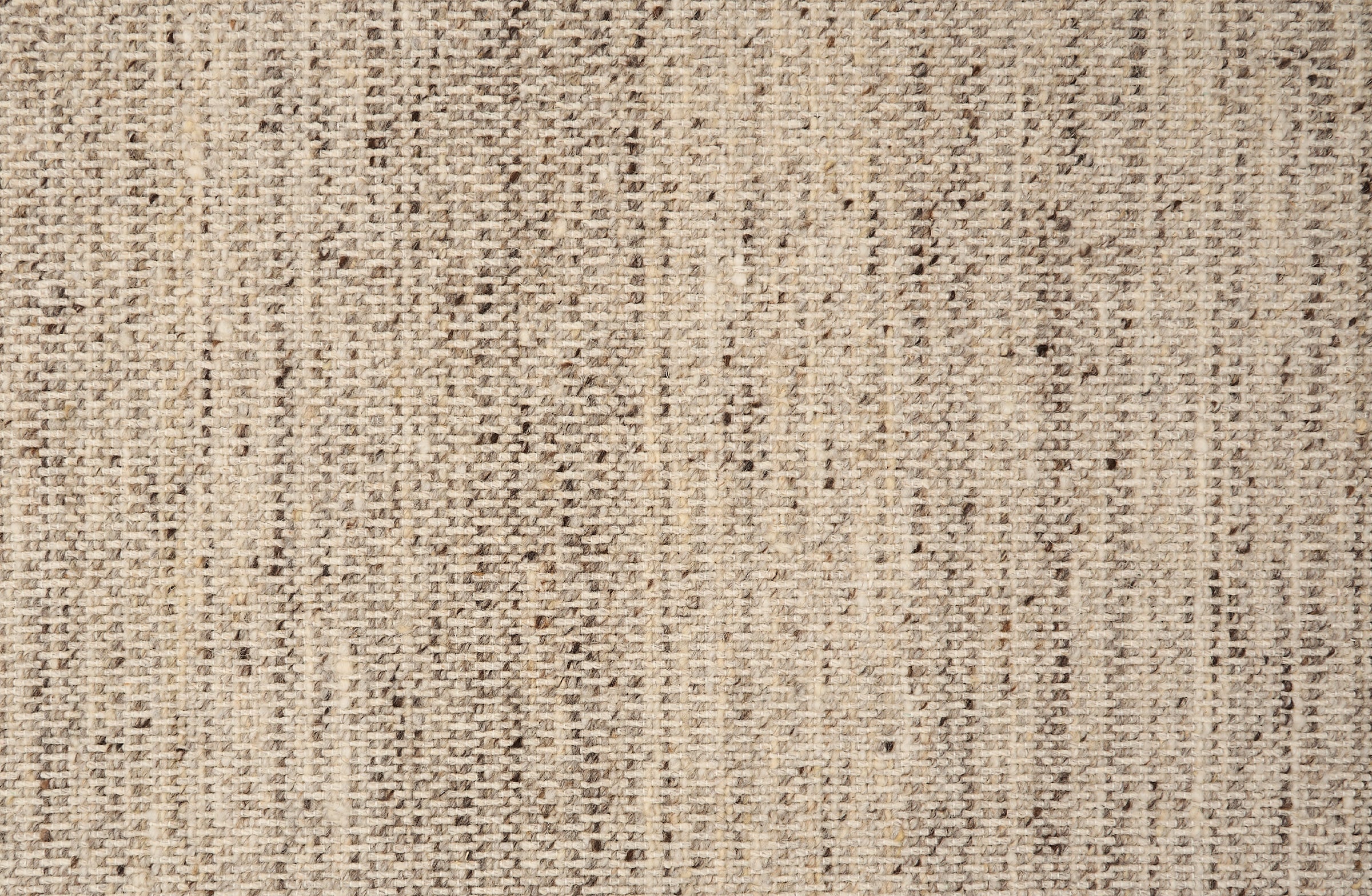 Textural strié broadloom in shades of ecru and brown.