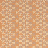 Patterned fabric with geometric design on a tan background
