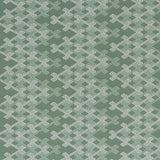 Textile pattern with white geometric design on a green background
