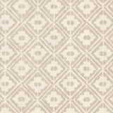 Detail of wallpaper in a geometric lattice print in tan on a cream field.
