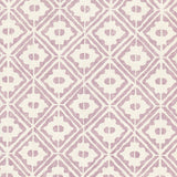 Detail of wallpaper in a geometric lattice print in purple on a cream field.
